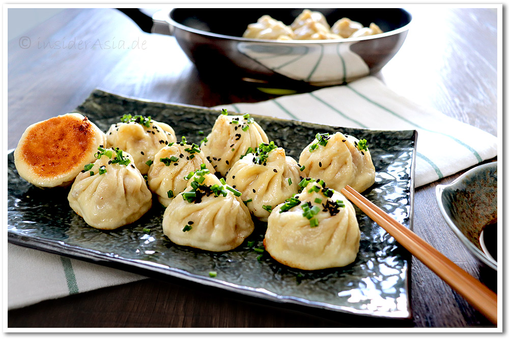 Sheng Jian Bao, eine Art asiatische Teigtasche, wird in China oft als Straßenessen verkauft